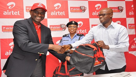 (L-r): Segun Ogunsanya, chief executive officer and managing director, Airtel Nigeria, presenting a gift to ex-Nigerian International, Mutiu Adepoju at the launch of Airtel Rising Stars (ARS) Season 4 U-17 football tournament held in Lagos, with them is Olympic Gold Medalist, Chioma Ajunwa-Opkara.